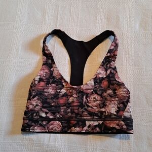 Lululemon Break Free Bra size 4 black with pink shades in floral design